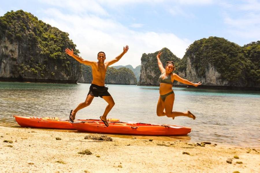 Relaxing on the white sand beach in halong bay in december